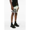 Trendy Rhude Letter Color Blocking Casual Sports Elastic Shorts for Men and Women's American High Street Beach Pants