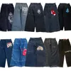 Mäns jeans harajuku hiphop retro skalle grafisk broderad baggy denim pants män kvinnor goth hög midja breda byxor