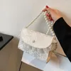 Axelväskor 2024 väska för kvinnor spets pu lapptäcke blomma broderi crossbody lady pearl kedja ruffle shopper purses och handväska