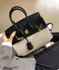 Internet Ins Platinum Celebrity Handbag Womens 2024 Summer Forhud med duk Kontrast Bag hand Bill of Lading Shoulder Handmade äkta läder