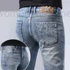 Herren Jeans Designer Jeans Herren Hellblau Slim Fit Small Feet High-End Feder Dünne lange Hosen 1JXK