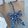 حقيبة حمل حقيقية الجلد 22 جديدًا جديدًا من سلسلة Junma Cloak Twill Bag Bag Bag Bag Bag Hight Right Long Hair Strap Family Strap Small Fluff Strap