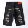 Hu yin fu shen wu fen pantalones de verano de verano de hombres cortos estampados bordados big m jacquard jeans delgados sueltos 341190