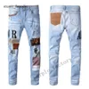 Мужские женские дизайнерские брюки Amri Biker Biker Emelcodery, разорванная для моды Amri Jeans Cotton Fashion Men Men Casual Pants Black Tealling 4839