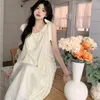 Abiti casual Donne senza maniche Bandage FAIRORE SCHI SCHEDA SCHEDA ALLA TENERE TENTERE SVIERA CHIMERMENTO MIDI MIDI Vintage Ulzzang Ladies