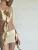 Calça de duas peças de duas peças de nicho de nicho sexy design tridimensional babados de flor de tubo superior de saia alta mano de saia feminina