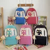 Rucksack weibliche Taschen im Verkauf 2024 Hochqualität große Kapazität farbige Reißverschlüsse Nylon Bag Multi -Pocket Student Student