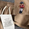 F7030# Летняя американская ретро-вафельская вафельная вышиваемая шорты мужская мода свободная эластичная шнурки Спортивные 5-очковые штаны 240412