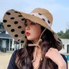 Berets breiter Krempe Frauen Sonnenvisor Hat Mode faltbare Eimer Hats Beach Cap geflimmte Anti-UV-Sommer