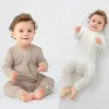 One-pièces Nouveau bébé Baber Bamboo Fibre Baby Boy Girl Girl Clothes Newborn Fisumettes Jumps Solide Longsleeve Baby Vêtements 024M PAJAMAS