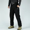 Multi-kieszeni męskie wojskowe spodnie swobodne spodnie towarowe spodni na zewnątrz spodnie spodni zużyte szkolnictwo wytrzymałości 240412