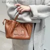 Bolsas de diseñador de celos para personas de alta gama para mujeres Bolso de cuero genuino NUEVO MINI MINI BOLSO BOLSA DE BOLSA PORTABLE A LANGO CAPABLE CON LOGO ORIGINAL