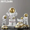 Ny modern heminredning astronautfigurer födelsedagspresent till man pojkvän abstrakt staty mode spaceman skulpturer guldfärg 26810896