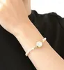 Armbanduhren keine Fade 2024 Messingband Japanische Frauenwache Luxus Retro natürliche Süßwasserperlenarmband -Muschel Quarz