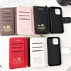 iPhone 15用のデザイナー電話ケース14 Pro Max Leather Handheld、Luxury Phone Case Wallet 15 Plus 14 Plus 13 12 Pro shockproof Slim Handbag Cover with Card Holder