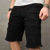 Jeans da uomo Summer streetwear uomini strappati giunture slim fit shorts shorts eleganti maschio solido jeans casual jeans pantaloni a cinque punti