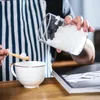 Bouteilles de rangement scellant des pots en verre avec couvercles et cuillères