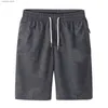 Short masculin pour hommes Sports Pocket Solid Trawstring Board Dry Beach Shorts Summer Summer Sight Risered Loose H240424