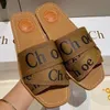 Designer Sandalen Women's houten sandalen platte canvas muilezel slippers kanten letters harige bont dames zomer buitenschoenen