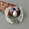 Yygem White Odlat sötvatten Pearl Keshi Pearl Czmicro Pave Butterfly Connector Armband 8 Bröllop för kvinnor 240414