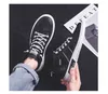 Chaussures pour hommes respirants Nouvelles tendances décontractées chaussures à tendance polyvalente chaussures blanches toile chaussures plates été petites chaussures blanches