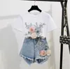 Shorti di jeans ad alta vita di moda set 2024 Summer Women 2 pezzi set da top-shirt in fiore 3d+pantaloncini in denim set a due pezzi