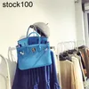 Platinum Handbag Sky Blue Lychee Grain Top Layer Cow Bag Women's Bright Simple Single Shoulder Messenger Handmade äkta läder