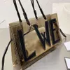 Designer strandpåsar kvinnors singel axel handväska ny high-end läder transparent tote lyxig avslappnad stor kapacitet handhållen shoppingväska