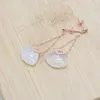 Boucles d'oreilles Han Hao S925 en forme de coquillage chic en argent sterling pour femmes accessoires de mode avec design unique