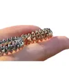 Populair en coole hoogwaardige unisex CNC Rivet Bullet Head roteerbare ringpaar nagel hoog met Carrtiraa originele ringen