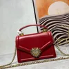 Frauen mit echten Ledertaschen für Frauen High-End-Designer-Crossbody-Kettenbeutel Pearl Bowtie Heart Button Tasche Europäer und amerikanischer Stil