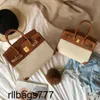 Internet Ins Platinum Celebrity Handbag Womens 2024 Summer Forhud med duk Kontrast Bag hand Bill of Lading Shoulder Handmade äkta läder