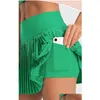 Strój jogi Al -0003 Kobiety sportowe sportowe stanik stanik elastyczny pasek mody plisowany spódnica damska aktywna odzież z kropli dostawa na zewnątrz fitn otbnu
