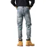 Spring New Jeans med trasiga hål Mens mode märke Elastic Slim Fit broderade lappar målade fötter G435