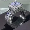 Bandringen super stralende vrouwen mannen mode ring prachtige zilveren kleur ingelegde zirkon stenen bruiloft voor verloving sieraden H240424