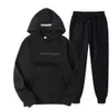 2023 dames tracksuits trainingsbroek pak ontwerper 2 -delige set herfst kleding slijtage hoodie jas herfst winter warme mode letters jacquard straat outfits