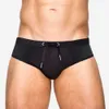 Mäns badkläder UXH Mens Bikini badkläder med push-up sexig utbuktning Förbättrande ihålig ut rena svarta genomskinliga simningskorts hi-q snabbtorkande D240424