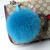 2024 Luxury 13cm Fluffy Real Fox Fux Fur Ball PomPoms Fur Pompom高品質のキーチェーンカーキーチェーンメタルリングペンダント240424