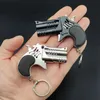 Pun Toys 1pcs mini llavero goma de goma de metal juego de pistola juguete lanza de pistola para niños simulación de pistola regalos PENDL2404