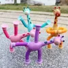 Dekompressionsleksak 1/4 st barnsugningskoppleksaker Kids Giraff Pop Tube Sensory Spela tidig utbildning Stress Relief Squeeze Fidget Games D240425