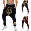 Pantaloni Nuovi 2021 Spring Autumn Casual Casual Basso Crotch Hip Hop Piede Pants Streetwear Street Dance Gold Numero di pantaloni stampati uomini