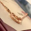 Designer Trend Carter Cake Roman Double Ring Necklace Gold vergulde 18K in elkaar grijpende hanger met kraagketen voor vrouwen SQRD