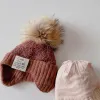 アクセサリーkinderen meisjes jongens冬のヘルムゲブライドムッツはookleppen oren fleece kinderen peuter leuke caps baby accessoires pom