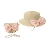 Basker 2024 mode baby girl strå hatt söt pärla båge breda grim solskydd mössor och crossbody väska för småbarnsresor