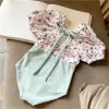 Traje de baño adorable bebé floral One Piece Swimwear+ Cap 2024 Summer Corea Corea Backless Swimsuit para niñas Bikini