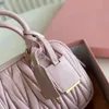 Designer luxury cowhide totes Bag luxurys mesenger bag womens totes Classic pink pleated bowling handbag single shoulder bag crossbody bag size 20*12CM with box