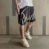 Modemärke Rhude Letter Jacquard stickad tröja Casual Shorts för män och kvinnor, American High Street Capris