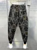 Spodnie moda ulica Hiphop Floral Pants luz luz haremowe spodnie najnowsze wysokiej jakości luksusowa marka odzież męska