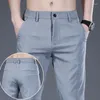 Мужские брюки 2024 Летняя ретро -элегантная мода свободная одежда нерегулярная кнопка кнопки кнопки кнопки «