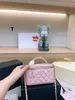 2024 Designer Makeup Liten Vanity With Chain Quality Leather Crossbody Sadel Bag Luxurys Handväskor Diamond Lattice Golden Ball Women Axel 88